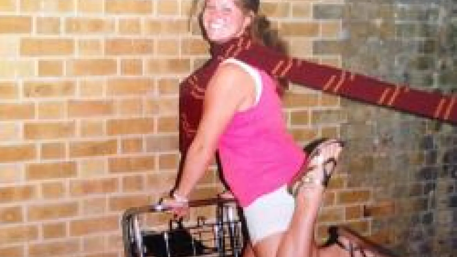 Kacie Parke in front of platform 9 and three-fourths
