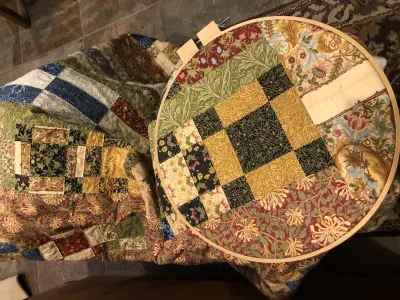 Patchwork of fabrics designed by William Morris and May Morris
